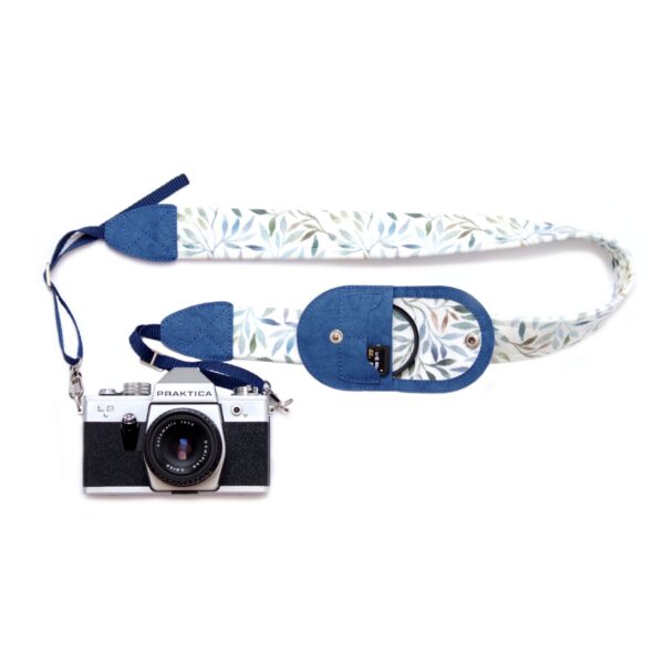 Camera with beautiful camera strap with lens cap holder made of vegan leather